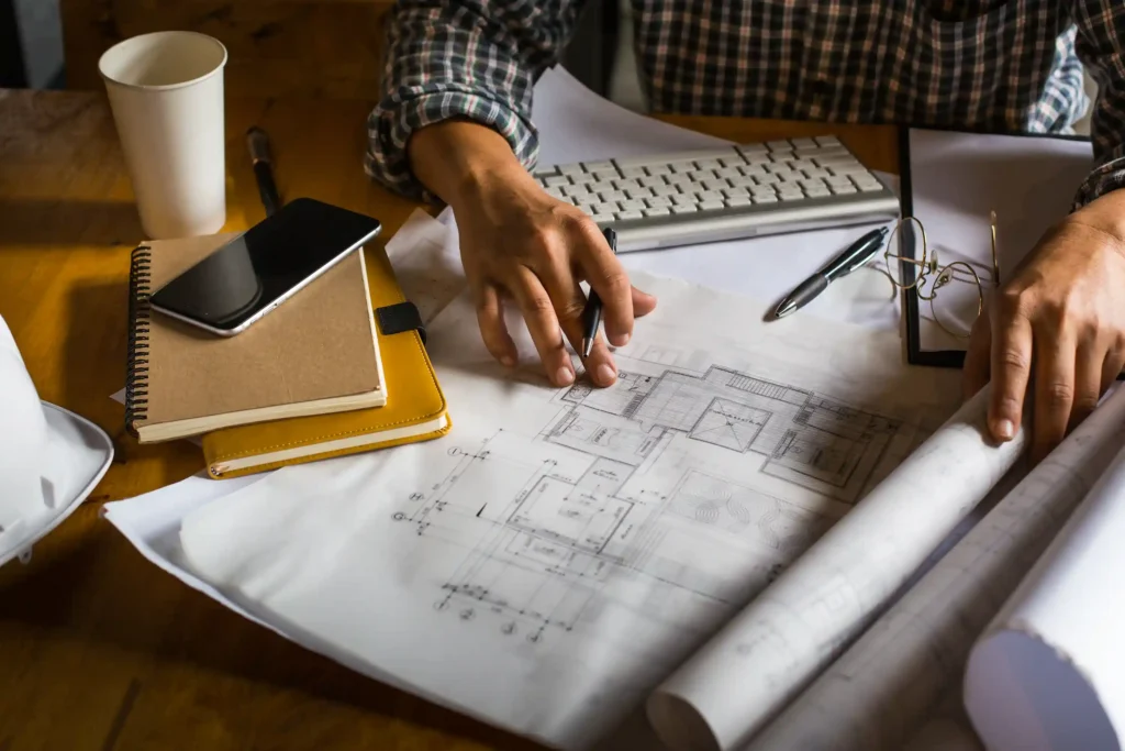Architectural plans reviewed during a Solmaz planning consultation